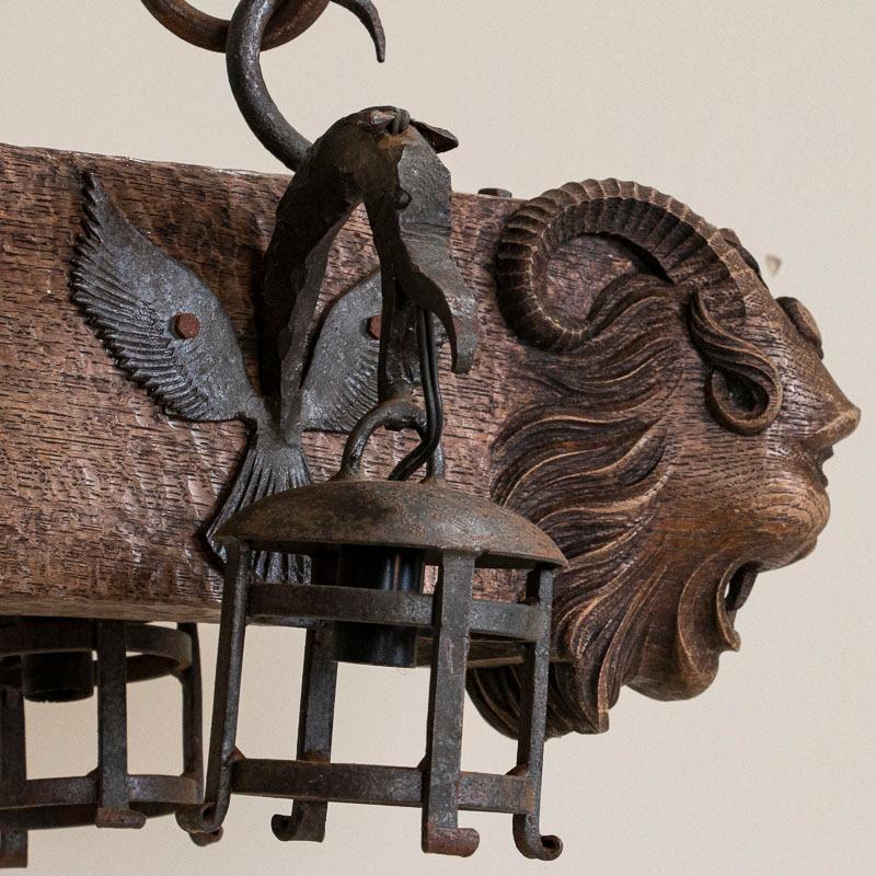 Antique Wood and Wrought Iron Horizontal Chandelier with Carved Gargoyle Heads 3
