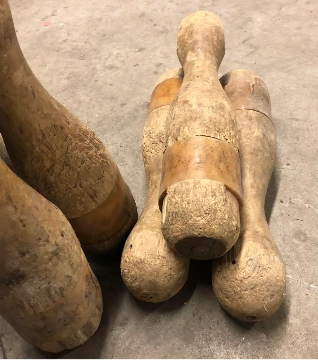 Set of 6 Vintage Bowling pins made of wood with an aged yellow detail band.