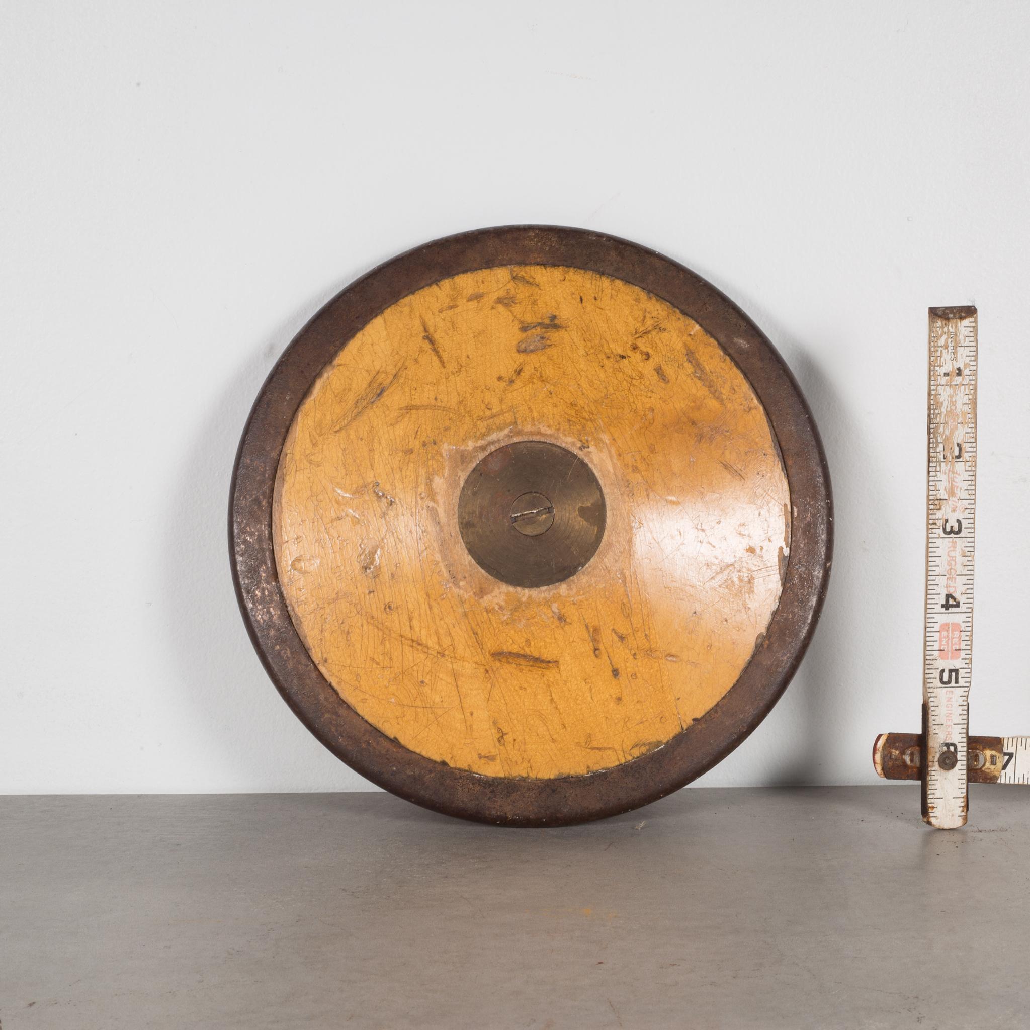 About

A wood discus with brass center and steel rim.

Creator: Unknown.
Date of manufacture: circa 1920s.
Materials and techniques: Wood, brass, steel.
Condition: Good. Wear consistent with age and use.
Dimensions: H 1.5 in. W 8.5 in. D 8.5
