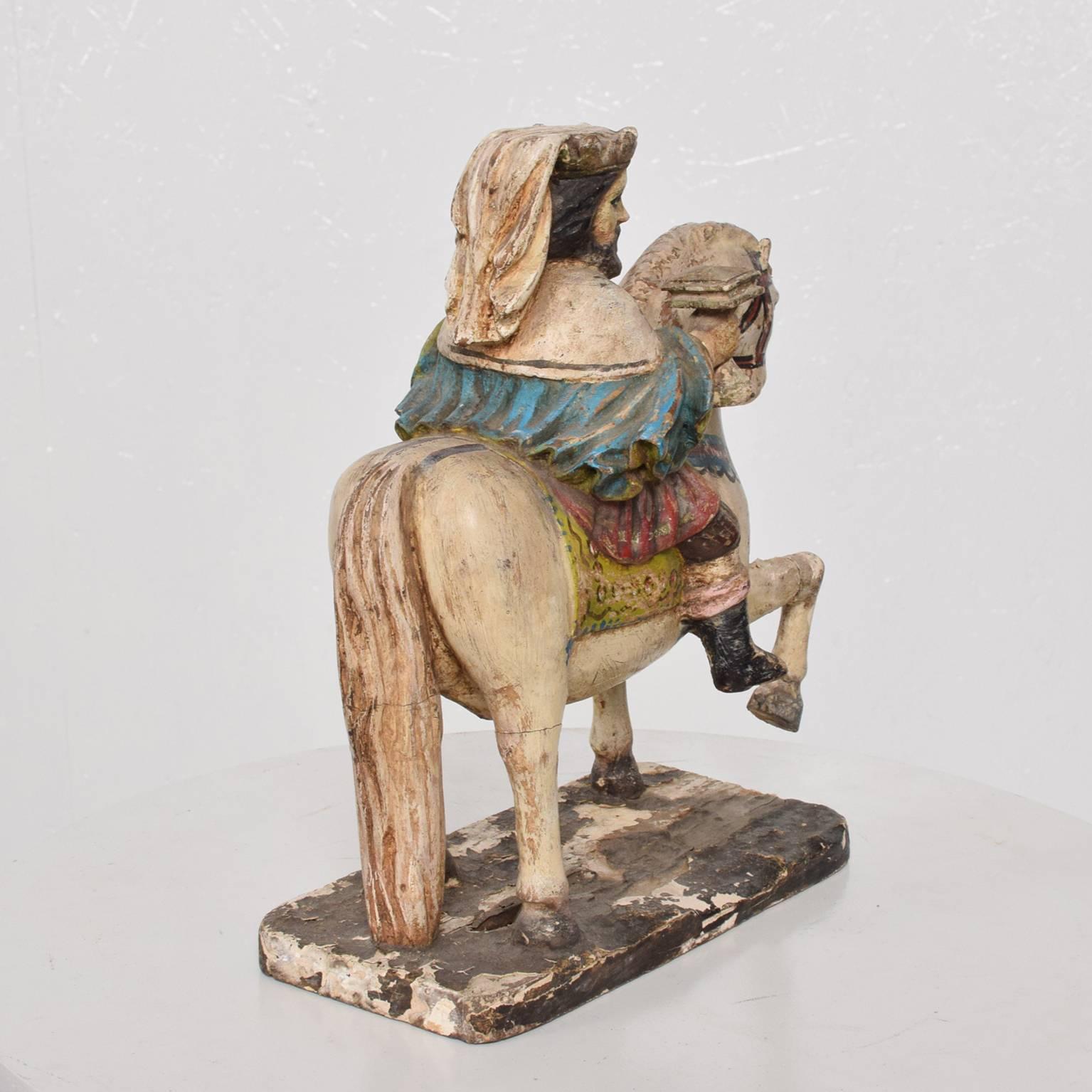 For your consideration, a beautiful antique decoration of horse and king carved in solid wood and decorated by hand. 

Dimensions: 11 3/4