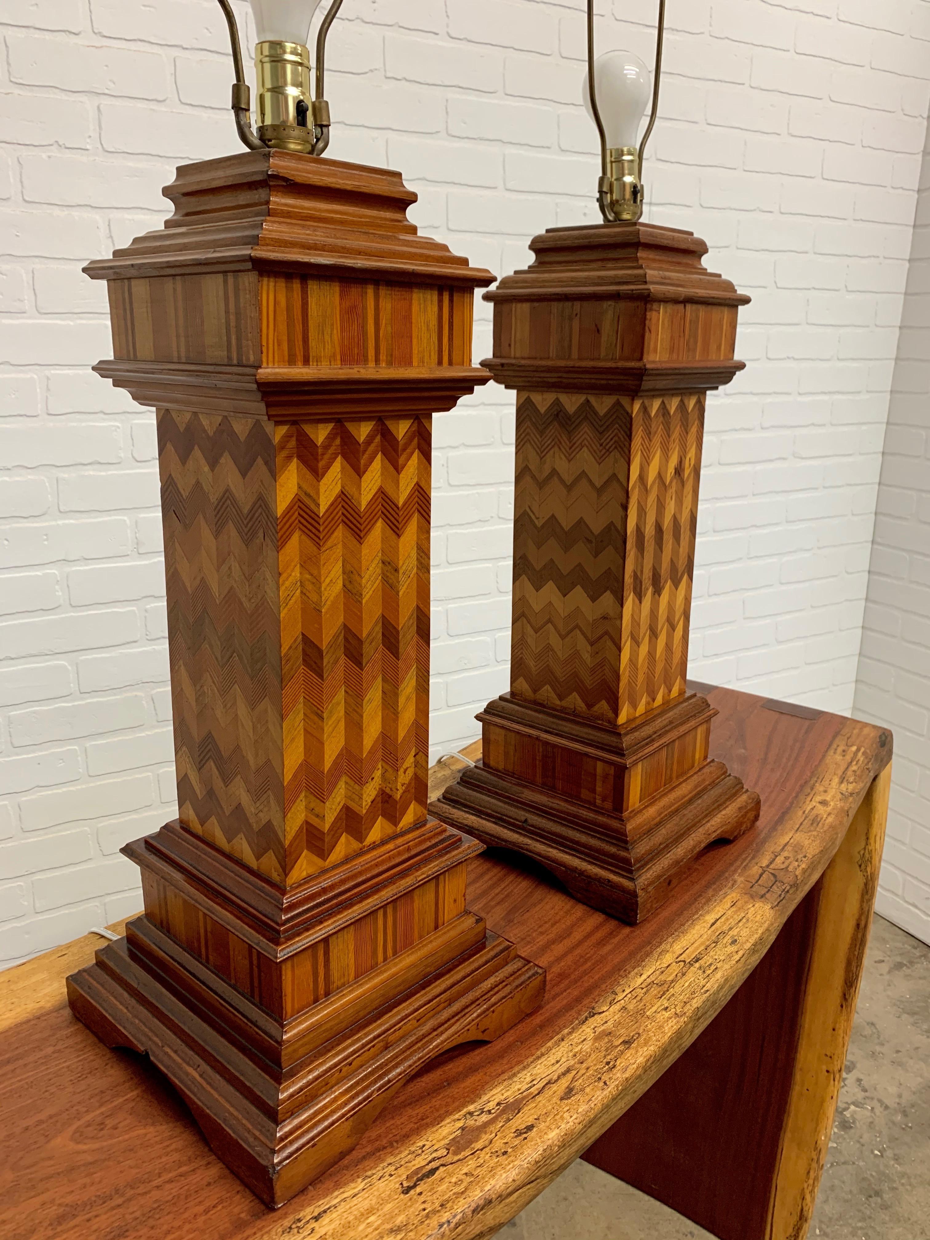 These are an older conversion with zig zag marquetry inlaid on these large wooden lamps. Shades are not included
The height measurement is to the top of the socket 26.5/8
