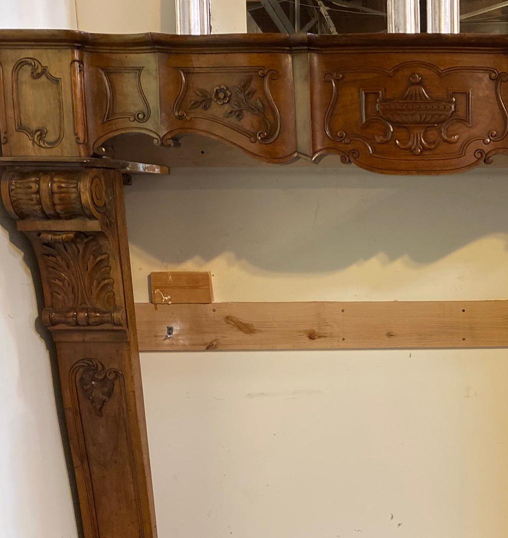 Antique wood mantel. This handsome mantel is sure to be a crowd pleaser and great topic of conversation. Origin: France, circa 1880. Measures: 82 1/2