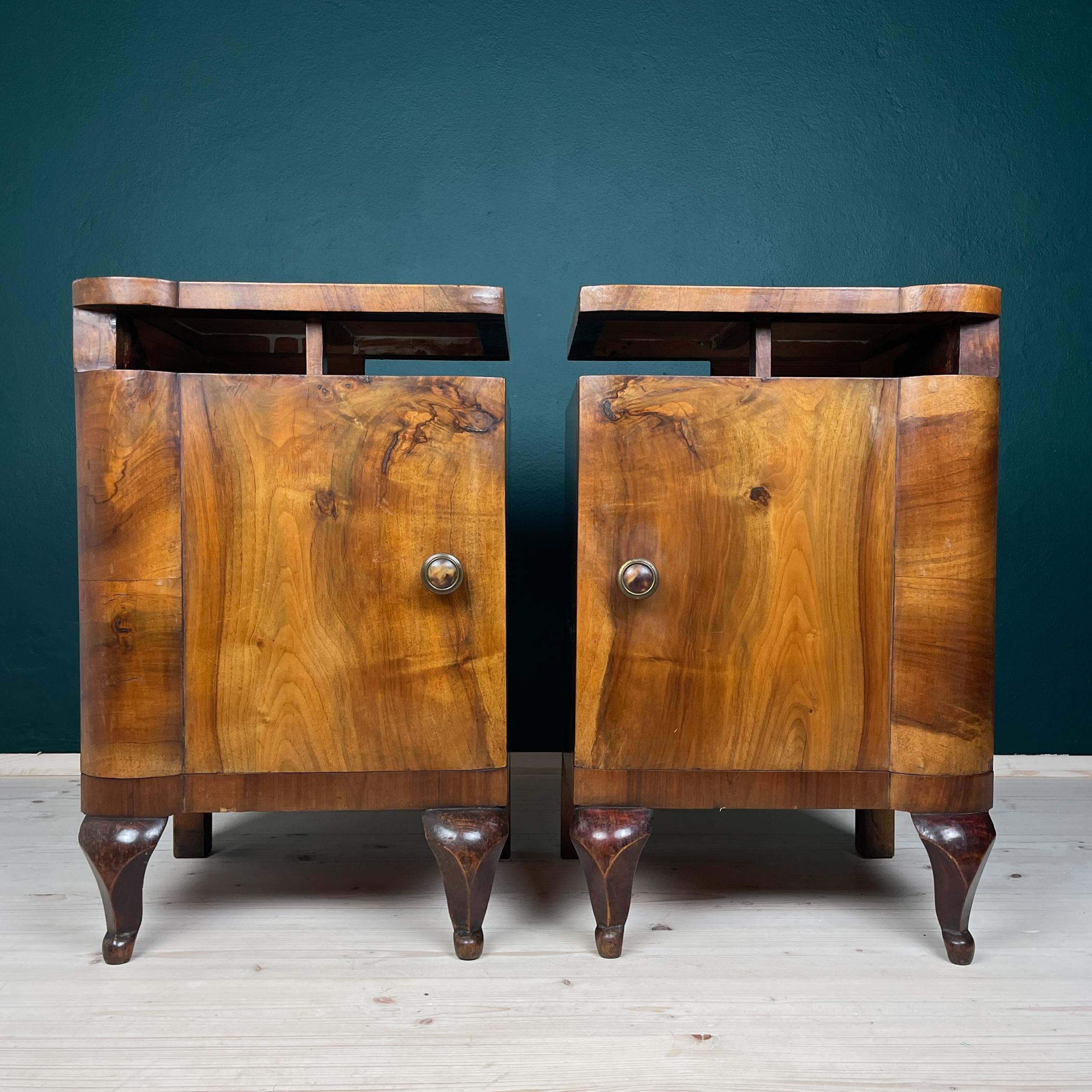 Pair beautiful bedside tables were made in the 1940s in Italy. Made of solid wood. Old original fittings.

The nightstands are in very good vintage condition.

Dimensions:
Width: 32 cm / 12.6 inches
Height: 66 cm / 26 inches
Depth: 36 cm / 14.17