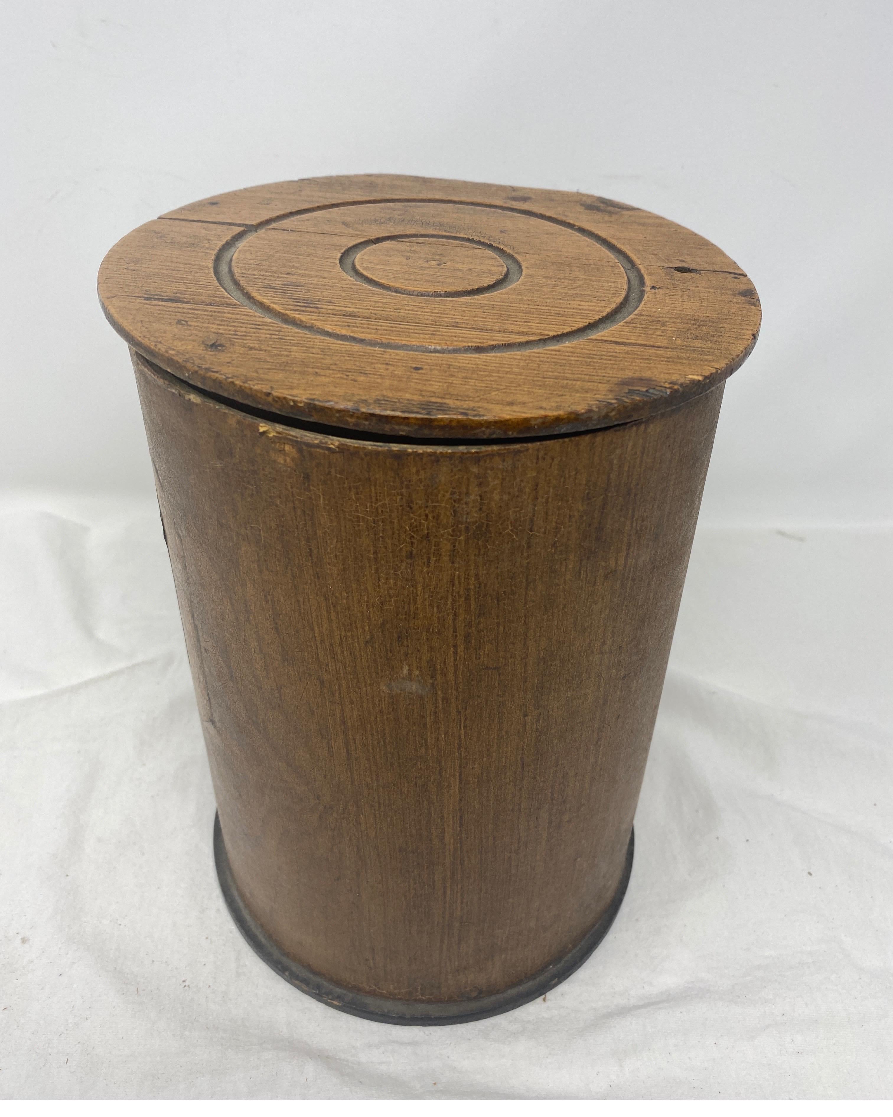 Antique wooden apothecary pharmacy storage jar with lid. A large 9 inch wood and fiberboard apothecary jar or canister. With Souchoiig, a fine variety of black tea is written on a paper label. l. The top and bottom are made of wood, and the sides