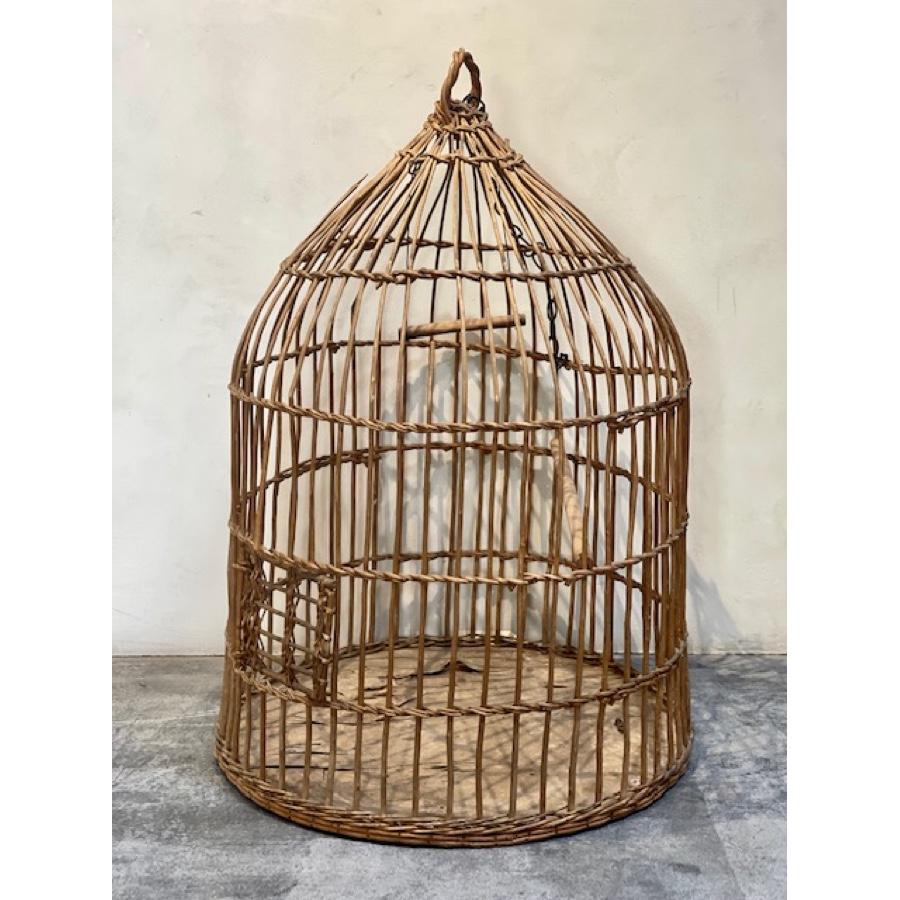 Antique wooden birdcage with twigs / reeds. Woven details. Some wear. Large scale - very cool to hang or decorate with. 

Item #: AC-0609

Dimensions: 45”height x 36”diameter.
 