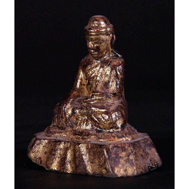 Material: wood
10 cm high 
9 cm wide
Weight: 0.05 kgs
Gilded with 24 krt. gold
Bhumisparsha mudra
Originating from Burma
Late 18th / early 19th century

