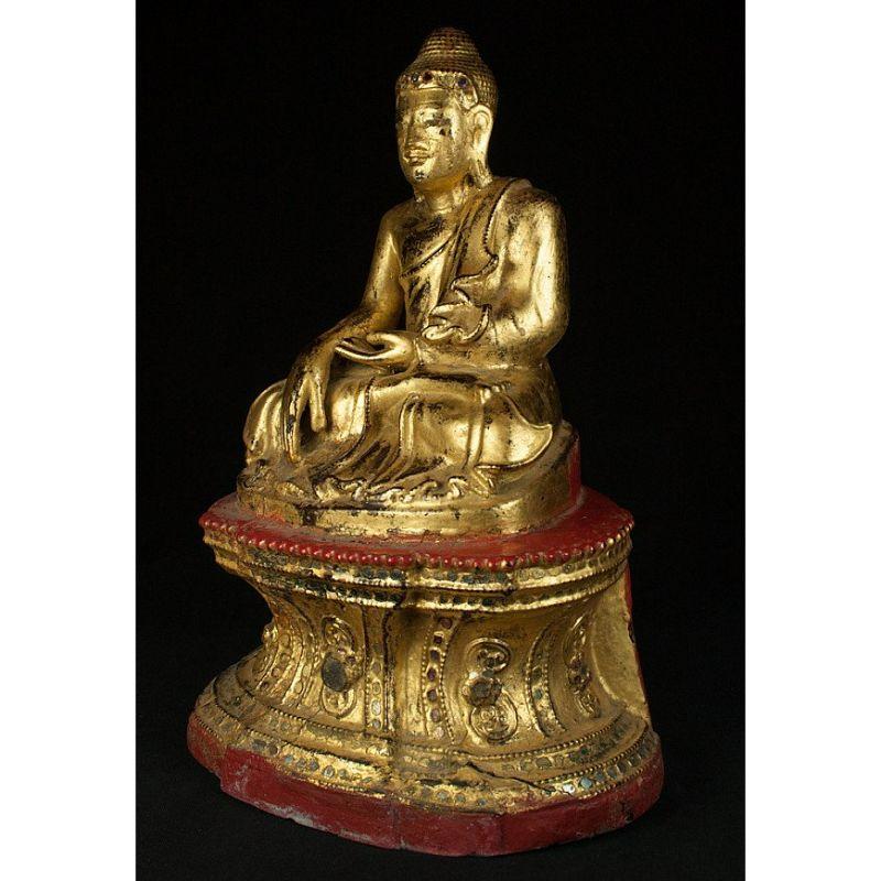 Material: wood.
Measures: 29 cm high.
20 cm wide and 15,5 cm deep.
Weight: 1.46 kgs.
Gilded with 24 krt. gold.
Mandalay style.
Bhumisparsha mudra.
Originating from Burma.
19th Century.

