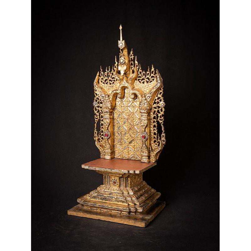 Material: wood
Measures: 69,5 cm high 
31 cm wide and 22 cm deep
Weight: 3.405 kgs
Gilded with 24 krt. gold
Mandalay style
Originating from Burma
19th century
In very good condition !


