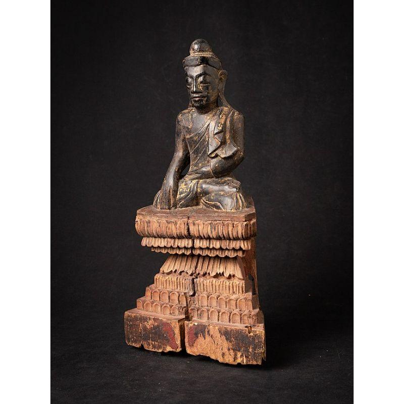 Material: wood
39,2 cm high 
20,6 cm wide and 9,6 cm deep
Weight: 1.027 kgs
Gilded with 24 krt. gold
Shan (Tai Yai) style
Bhumisparsha mudra
Originating from Burma
18th century

