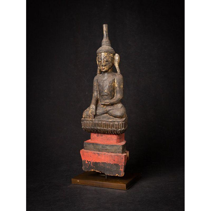 Material: wood
45,9 cm high 
16,8 cm wide and 11,6 cm deep
Weight: 1.262 kgs
Gilded with 24 krt. gold
Shan (Tai Yai) style
Bhumisparsha mudra
Originating from Burma
18th century

