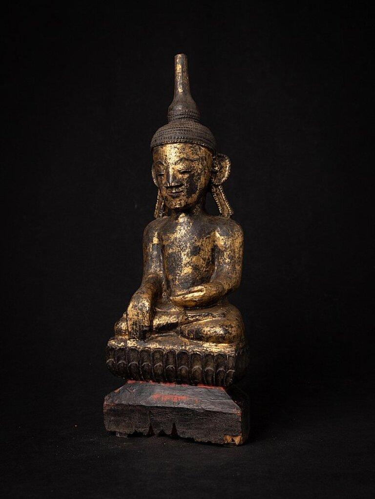 Material: wood
41,4 cm high 
15,6 cm wide and 9,5 cm deep
Weight: 1.229 kgs
Gilded with 24 krt. gold
Bhumisparsha mudra
Originating from Burma
18th Century.
 