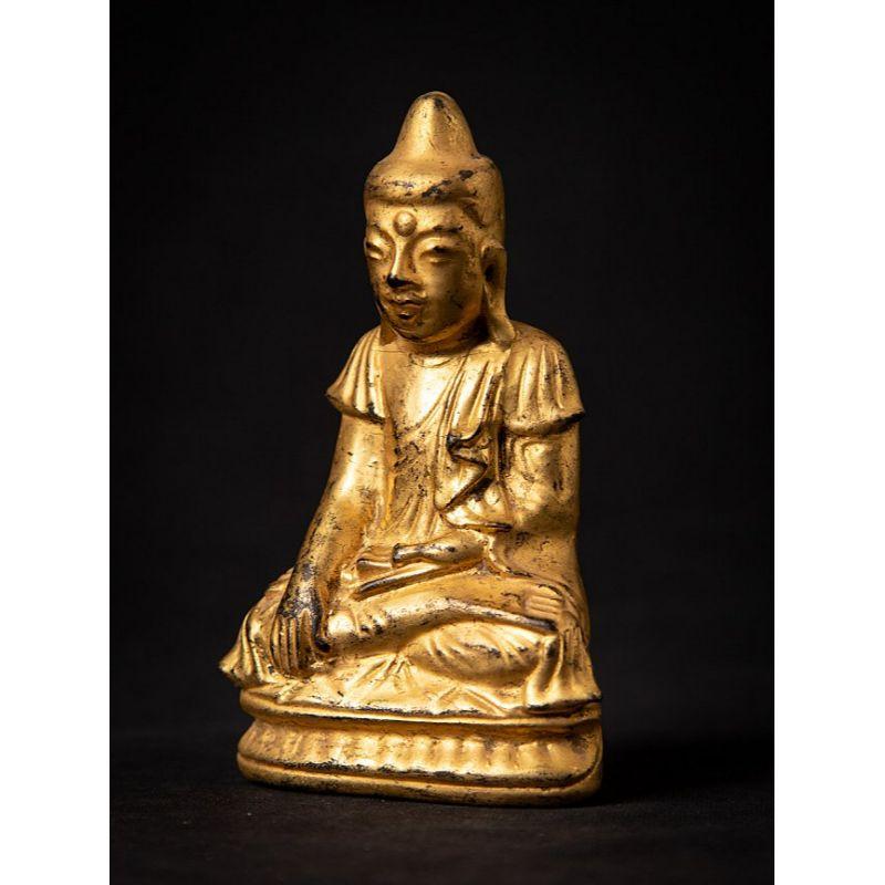 Material: wood
12,7 cm high 
7,8 cm wide and 3,8 cm deep
Weight: 0.091 kgs
Fire gilded with 24 krt. gold
Shan (Tai Yai) style
Bhumisparsha mudra
Originating from Burma
19th century
 