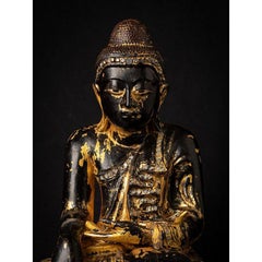 Antique wooden Burmese Buddha statue from Burma