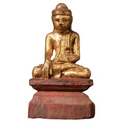 Antique wooden Burmese Buddha statue from Burma