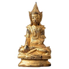 Antique wooden Burmese Buddha statue from Burma