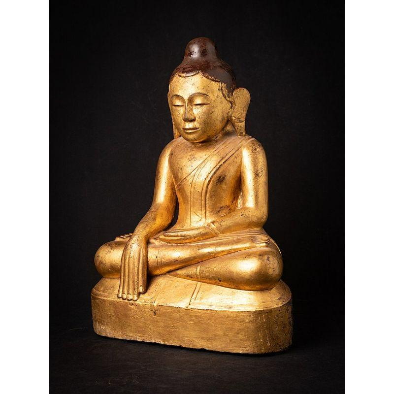 Material: wood
46 cm high 
33,3 cm wide and 20 cm deep
Weight: 6.271 kgs
Gilded with 24 krt. gold
Bhumisparsha mudra
Originating from Burma
19th century

