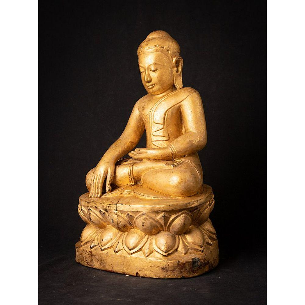 Material: wood
Measures: 49,5 cm high 
31 cm wide and 25,4 cm deep
Weight: 5.6 kgs
Gilded with 24 krt. gold
Bhumisparsha mudra
Originating from Burma
18th century
A very beautiful piece !

  