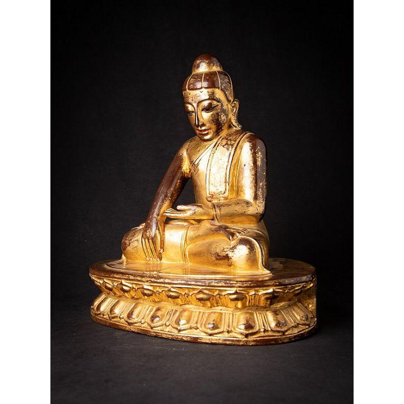 Material: wood
38,7 cm high 
36,2 cm wide and 25,6 cm deep
Weight: 6.05 kgs
Gilded with 24 krt. gold
Bhumisparsha mudra
Originating from Burma
19th century
With inlayed eyes
With drawer in the backside of the base for storing relics

