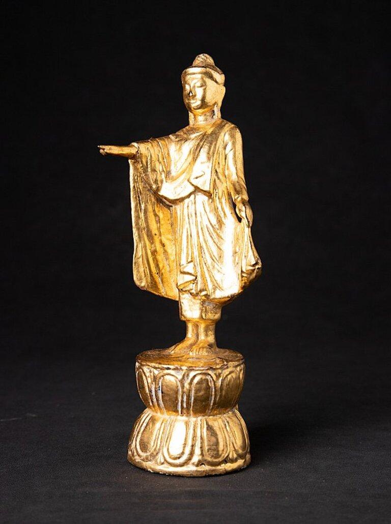 Material: wood
22,2 cm high 
7,8 cm wide and 6,2 cm deep
Weight: 0.152 kgs
Gilded with 24 krt. gold
Mandalay style
Originating from Burma
Late 19th / early 20th century
Does not stand completely straight, see photos. This can be solved by placing