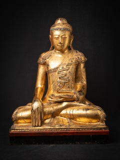 Antique wooden Burmese Mandalay Buddha statue