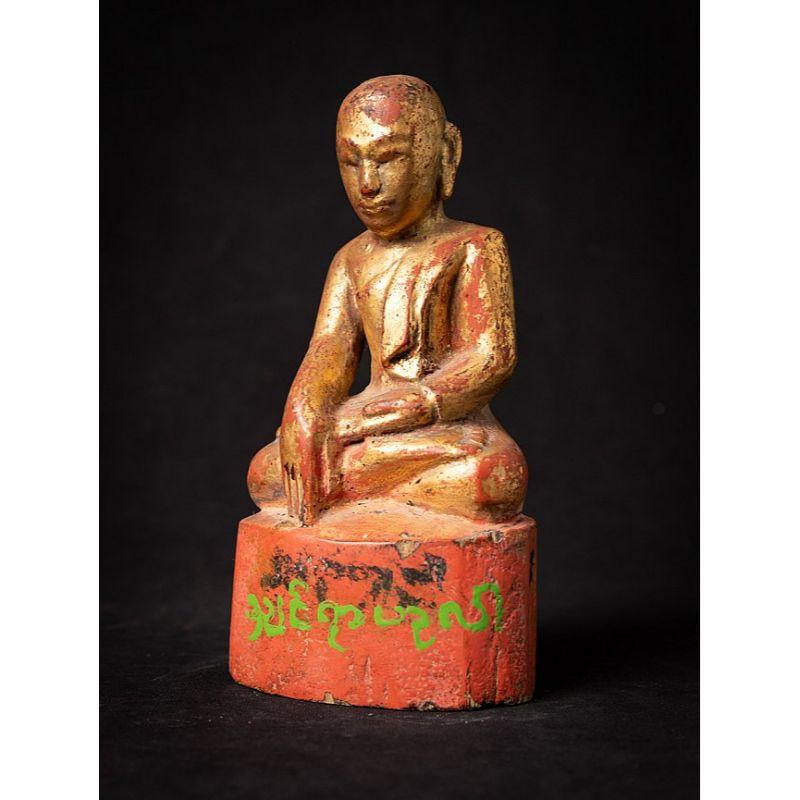 Material: wood
Measures: 18,7 cm high 
9,7 cm wide and 7 cm deep
Weight: 0.294 kgs
Gilded with 24 krt. gold
Shan (Tai Yai) style
Bhumisparsha mudra
Originating from Burma
18th century
With Burmese inscriptions.

