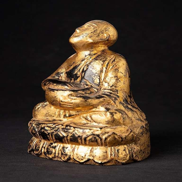 Material: wood
18,5 cm high 
12,7 cm wide and 10,3 cm deep
Weight: 0.538 kgs
Gilded with 24 krt. gold
Originating from Burma
19th century.
 