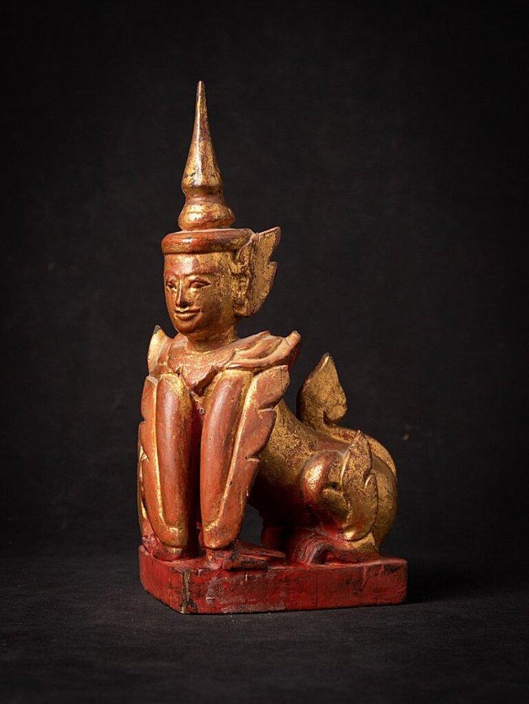 Material: wood
27,8 cm high 
17 cm wide and 12,7 cm deep
Weight: 0.741 kgs
Gilded with 24 krt. gold
Originating from Burma
19th century
Burmese name : Manutiha
