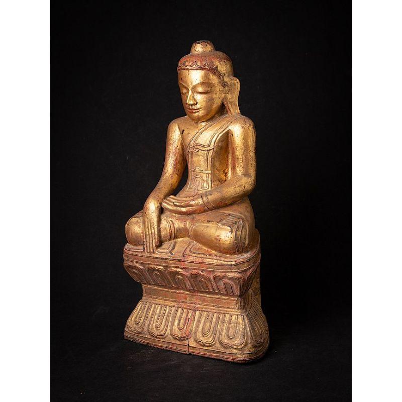 Material: wood
47,5 cm high 
25,4 cm wide and 17,5 cm deep
Weight: 4.165 kgs
Gilded with 24 krt. gold
Shan (Tai Yai) style
Bhumisparsha mudra
Originating from Burma
18th century

