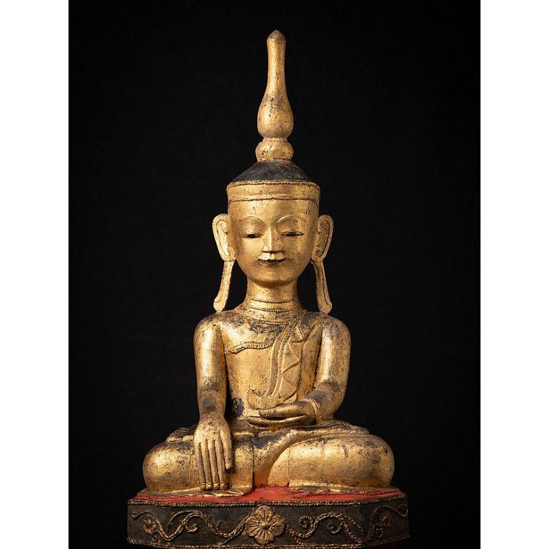 Material: wood
90,5 cm high 
40 cm wide and 27 cm deep
Weight: 7.15 kgs
Gilded with 24 krt. gold
Shan (Tai Yai) style
Bhumisparsha mudra
Originating from Burma
18th century

