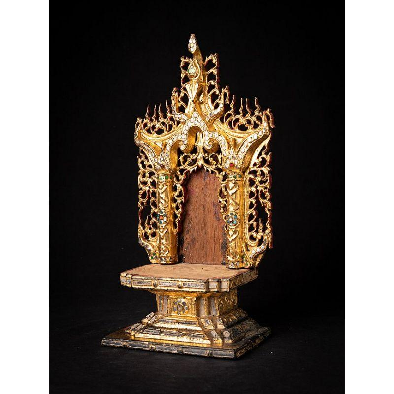 Material: wood
40,2 cm high 
21,5 cm wide and 13,5 cm deep
Weight: 1.073 kgs
Gilded with 24 krt. gold
Mandalay style
Originating from Burma
19th century.

