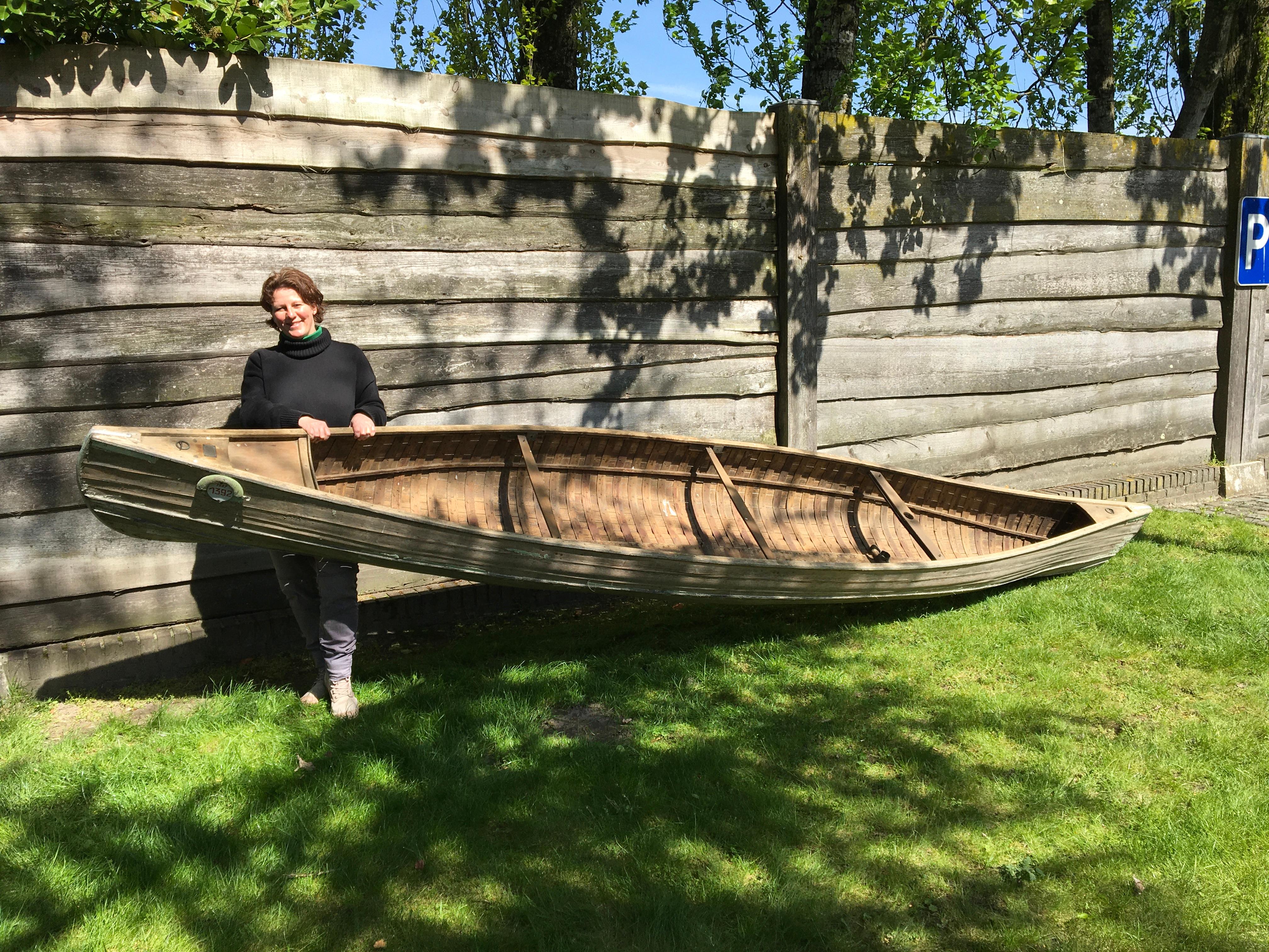 Antique wooden canoe dated 1947. 
A hand- crafted canoe which is an awesome decorative object by the size and by his design. Look at the details inside the boat, what a job it must have been to create the rounded model, a real piece of art and