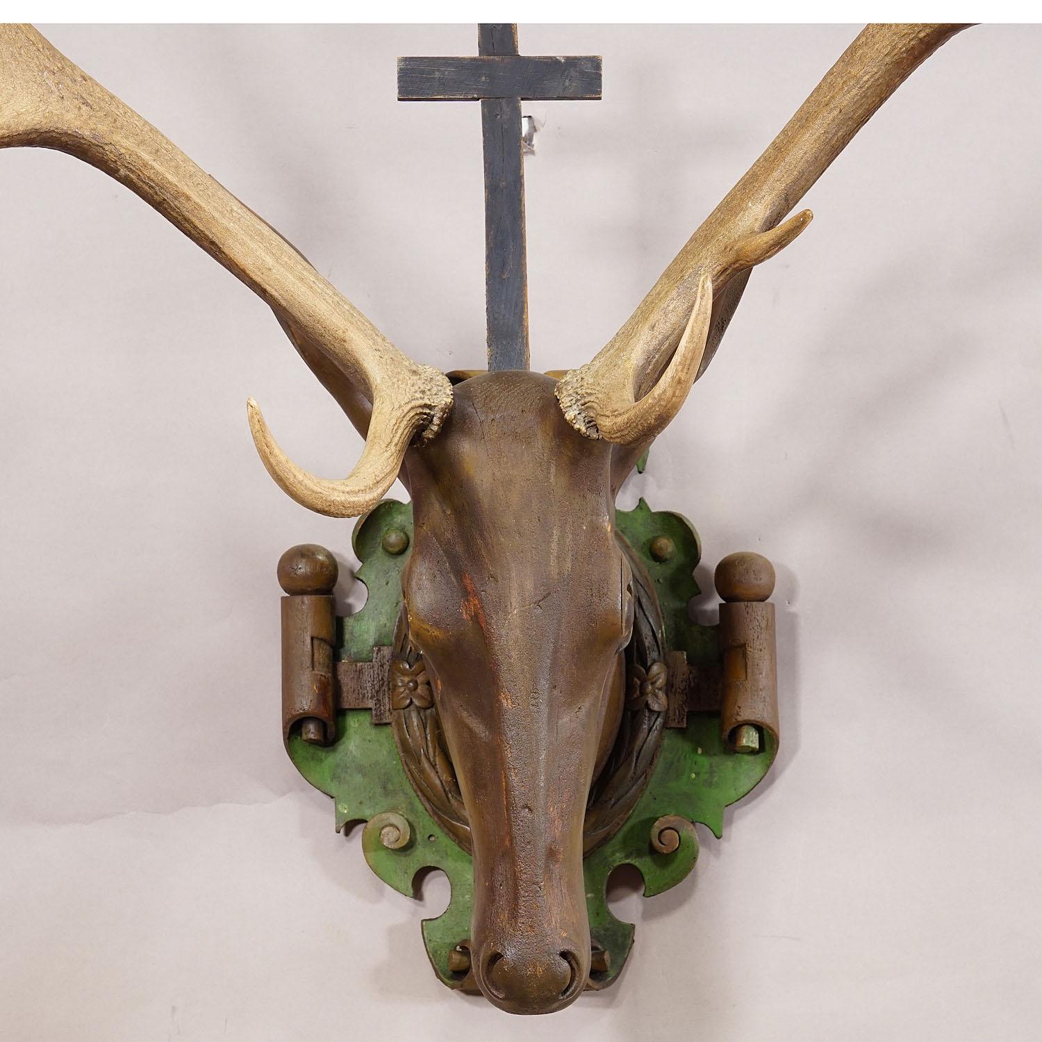 20th Century Antique Wooden Carved Black Forest Hubertus Stag Head with 12 Point Trophy