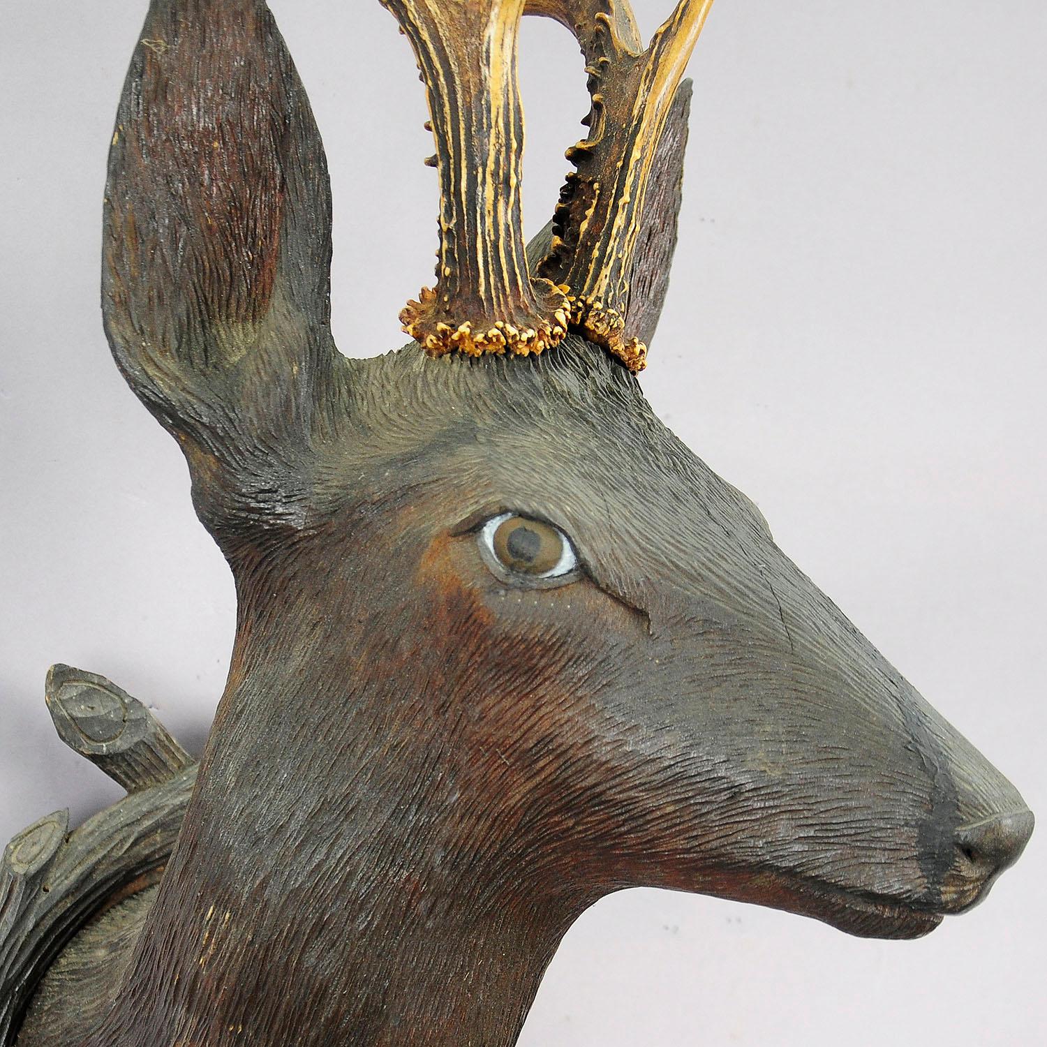 antique wooden deer head