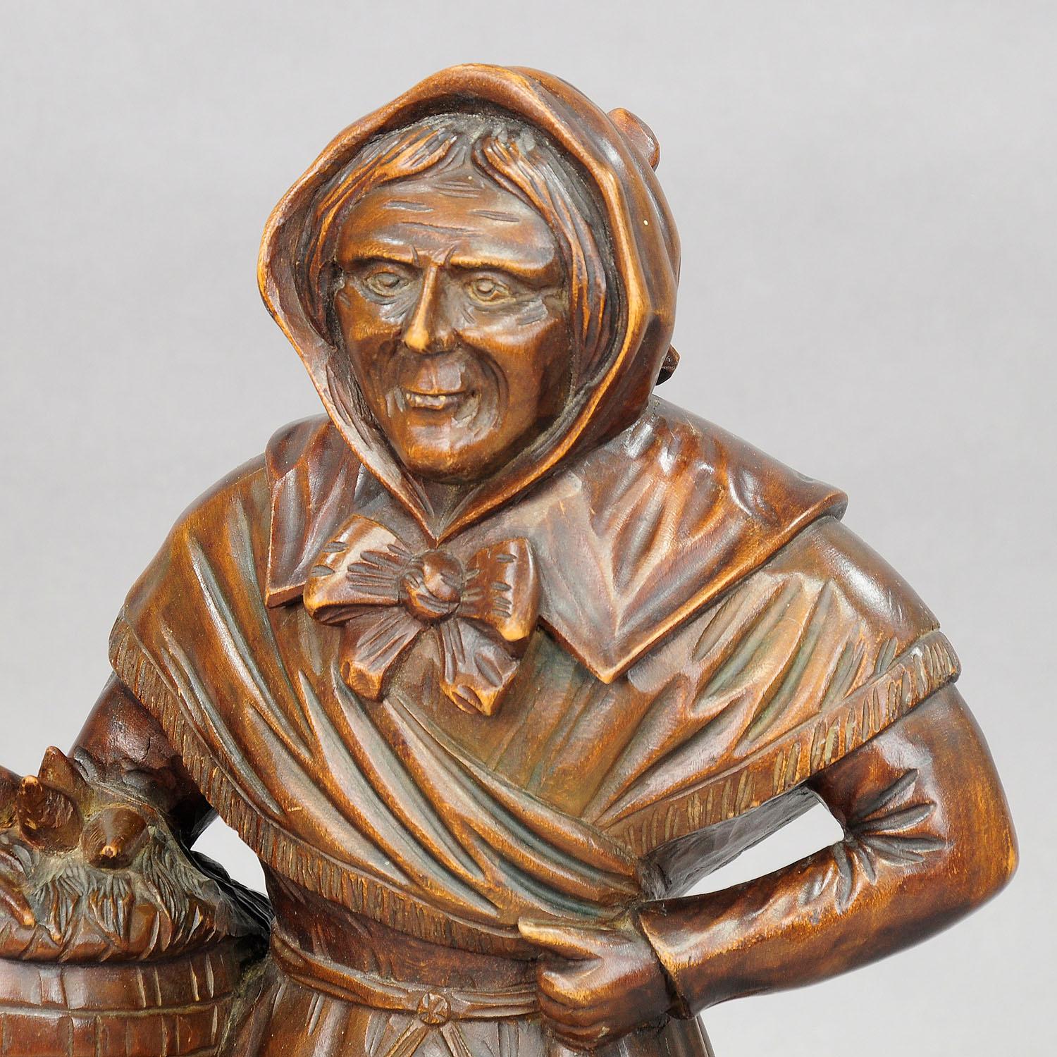 Black Forest Antique Wooden Carved Sculpture of a Folksy Countrywoman For Sale