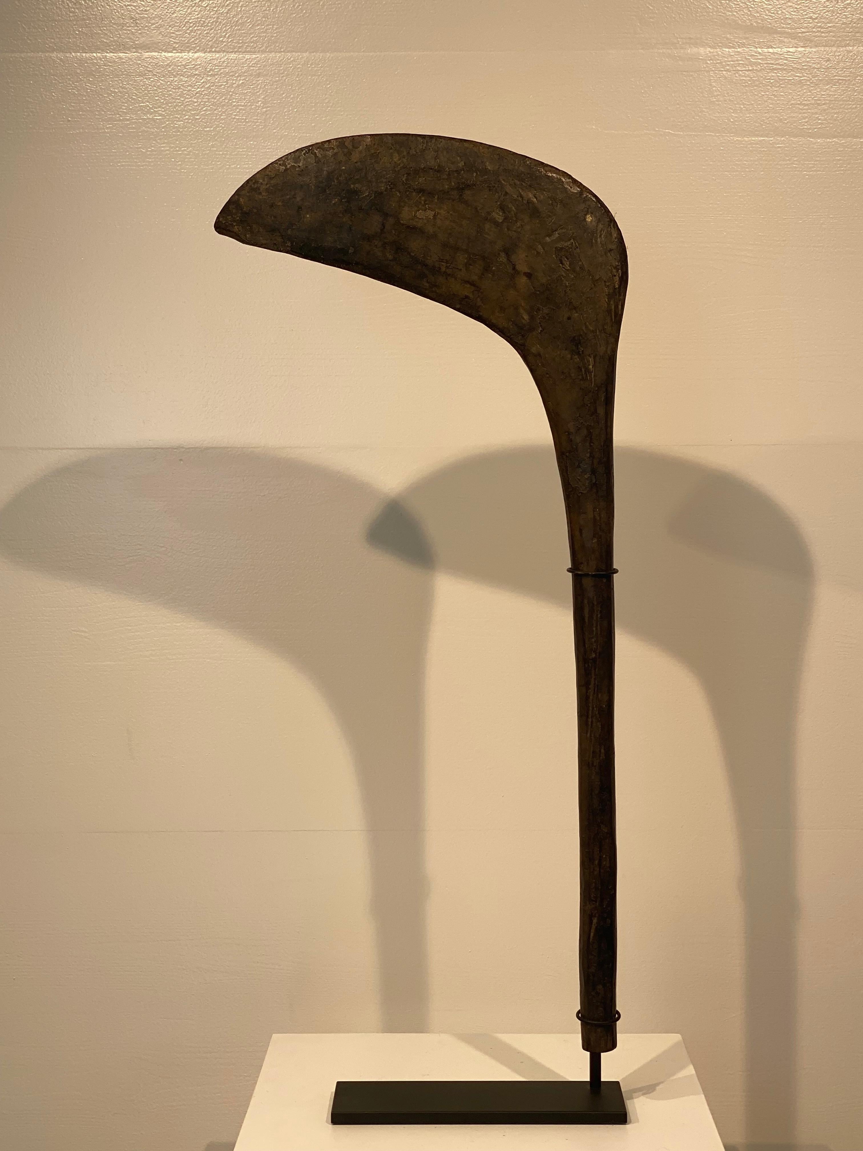 Elegant Ceremonial Wooden club from the Lobi Tribe in Burkina Faso,
dating from around 1960,beautifully carved and patinated,
mounted on a custom made iron stand,
very decorative piece