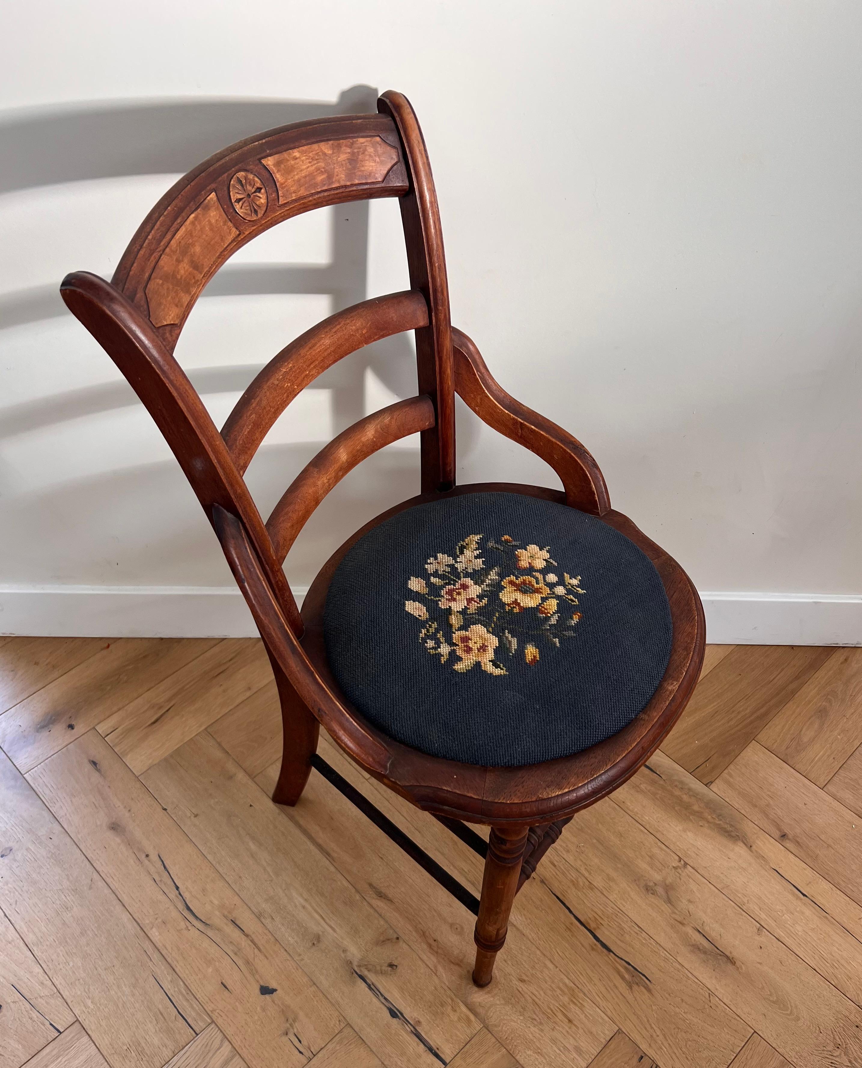 antique chair with needlepoint seat