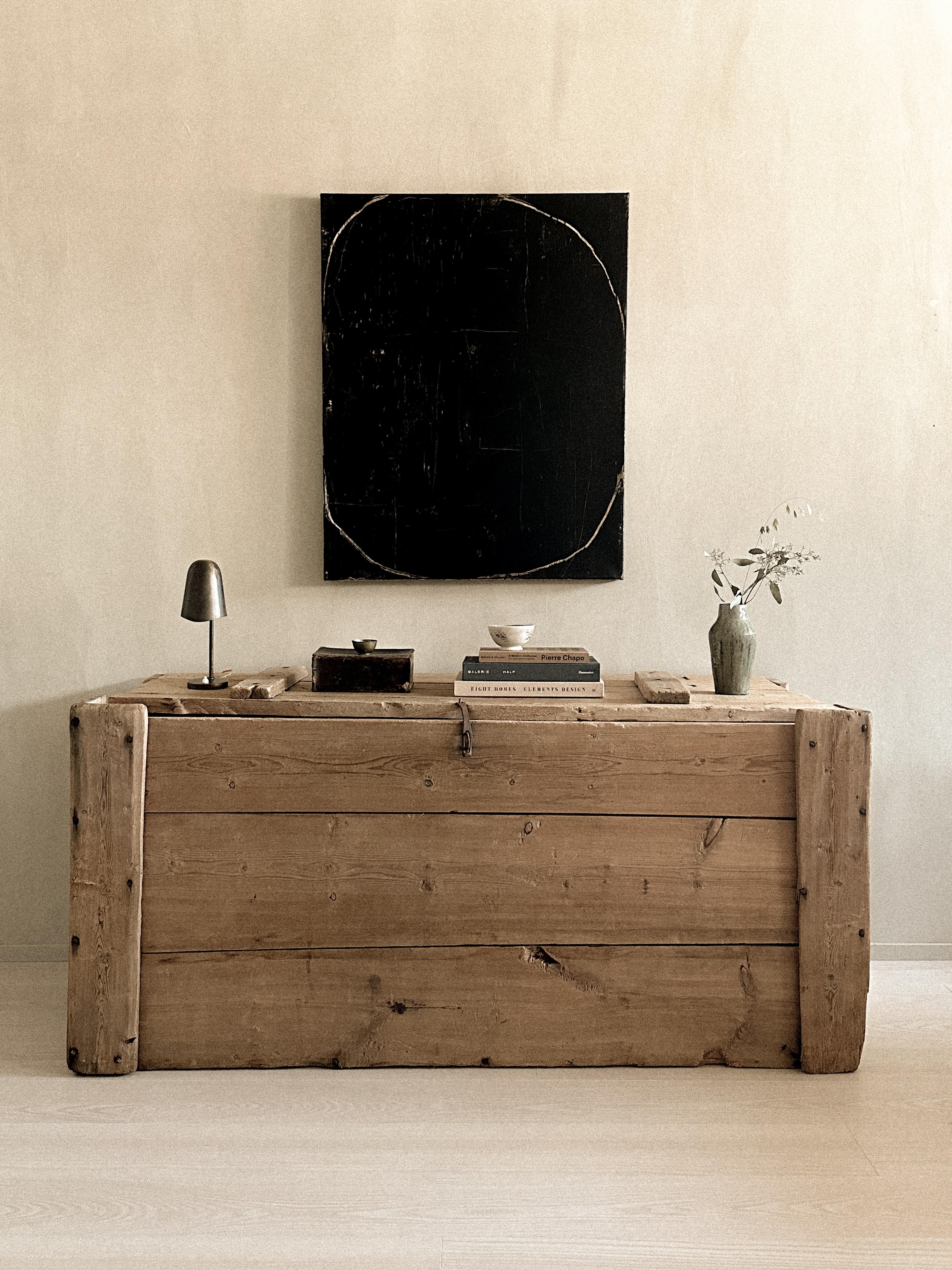 A Large antique wooden console, used as a grain chest from the 1700s. Crafted in solid wood with original iron fittings and a timeworn patina. A rare historical piece with strong character and presence.








