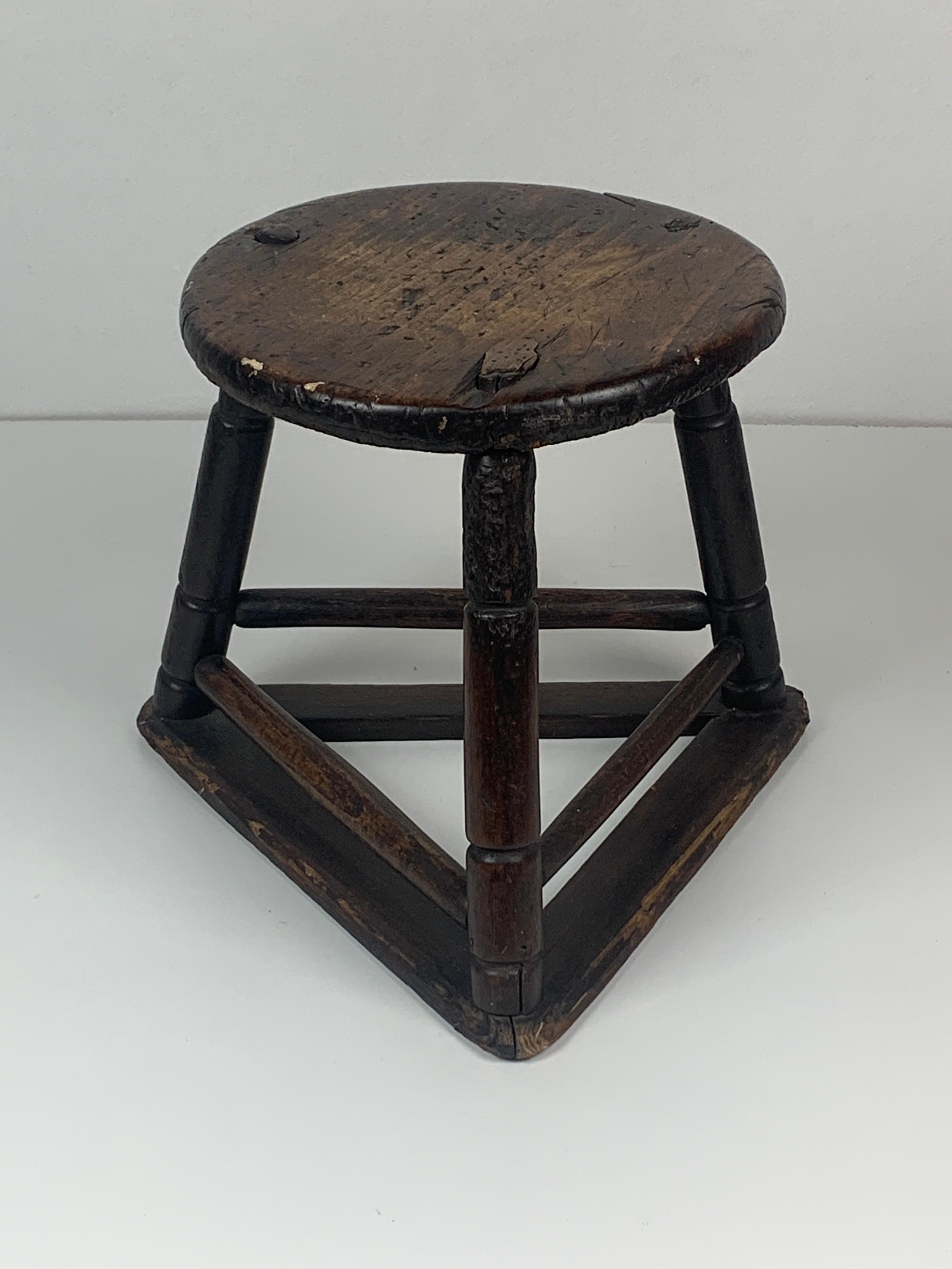 Gorgeous vintage jewellers or cutlers tripod chair probably from the United Kingdom. This lovely worn stool has had quite the life as can be seen in the pics but the age and wear just give this little stool more character. The seat has a diameter of