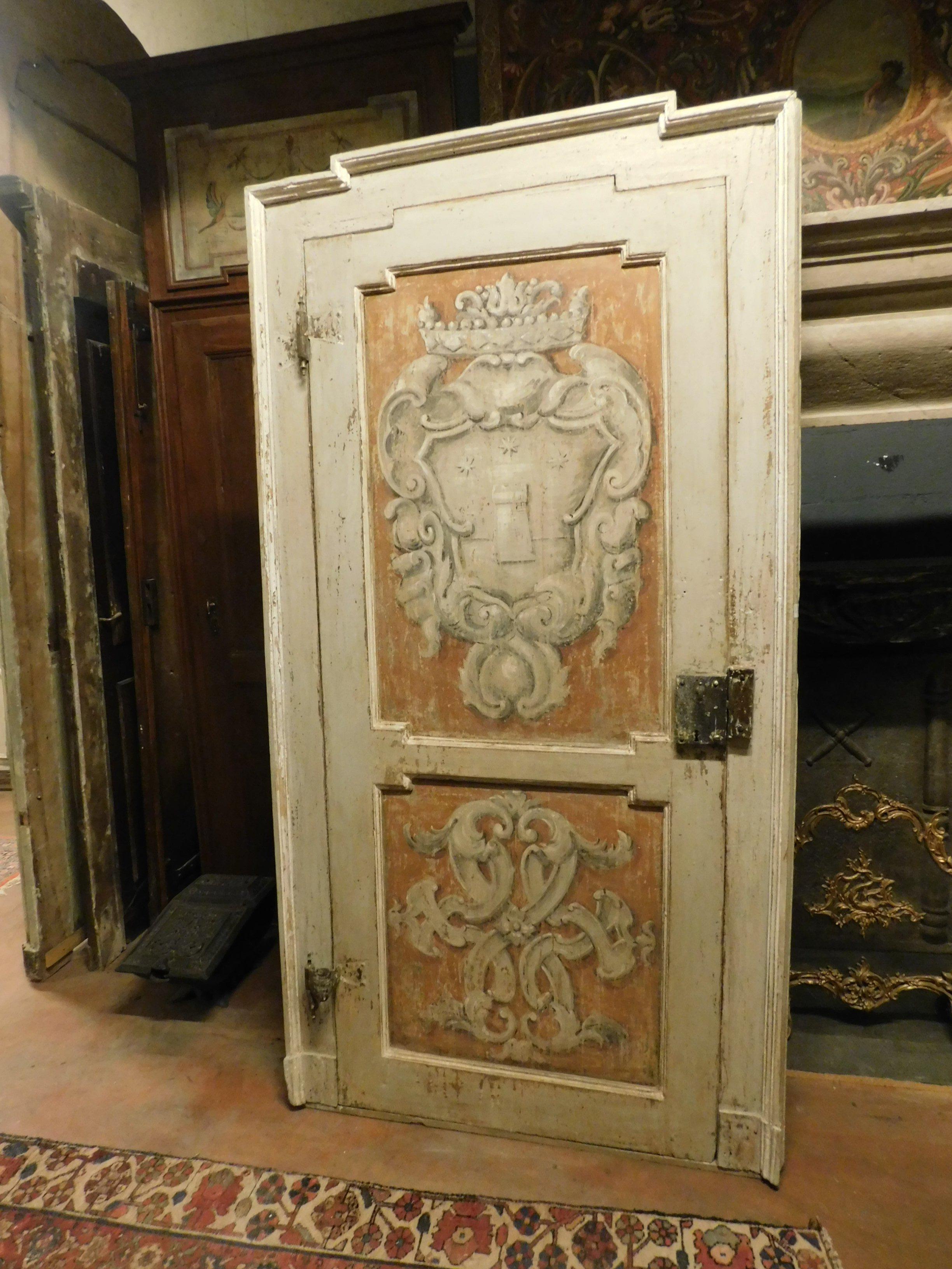 Antique solid wood door, indoor, hand painted with Classic landscape, back with painted panel and therefore well finished, original frame with sculpture in the upper part, orange and white colors, the door opens to pull with the original irons,