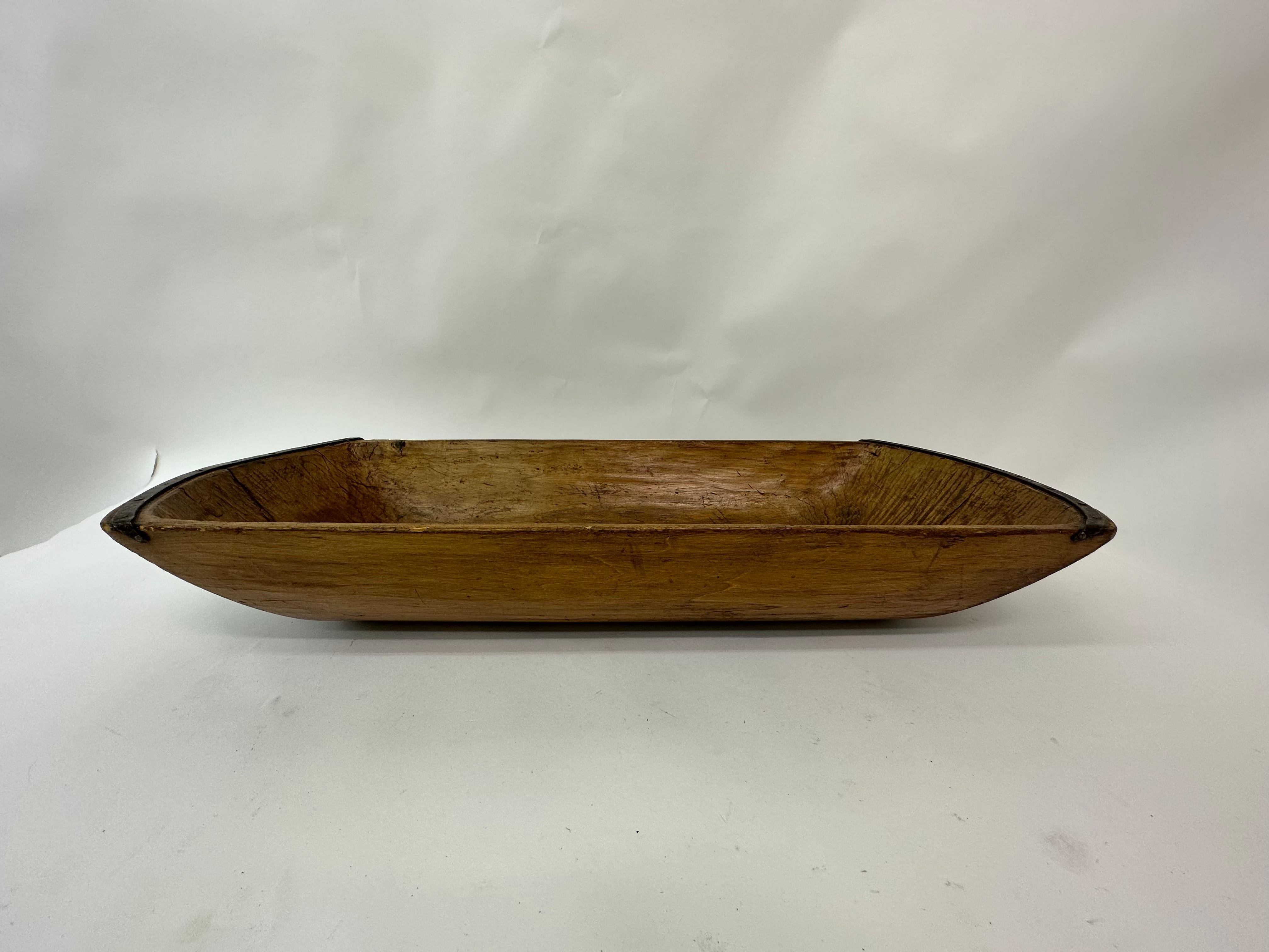 Antique wooden dough trough in unrestored, untreated original condition. A beautiful home decoration that can be used in many different ways.
Dimensions: 91cm W, 36cm D, 15cm H
Period: 1900
Material: Wood
Condition: Good