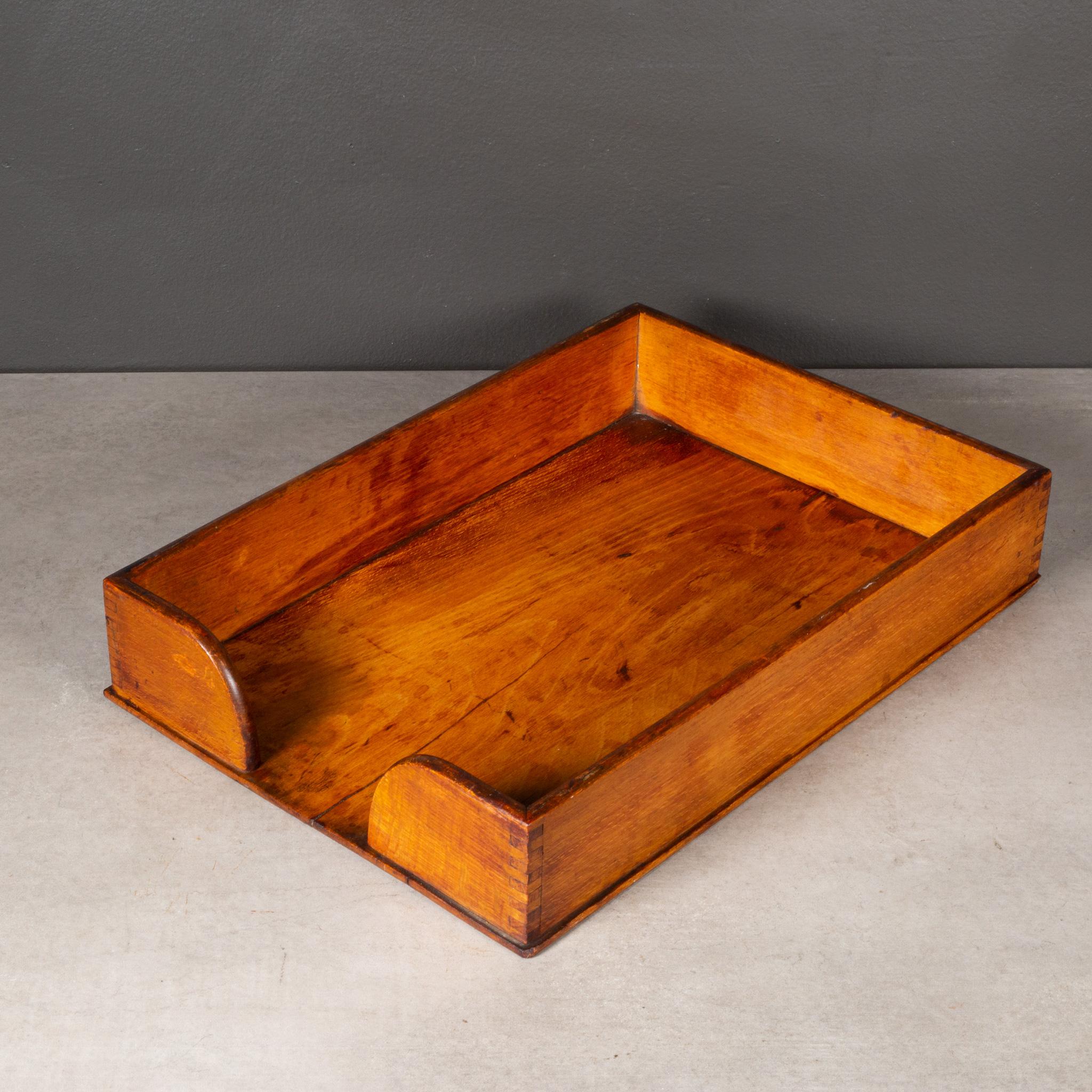 ABOUT

An antique wooden office tray constructed with dovetail joints. This piece has retained its original finish and has the appropriate patina for the age and use.

    CREATOR Unknown.
    DATE OF MANUFACTURE c.1930-1940.
    MATERIALS AND