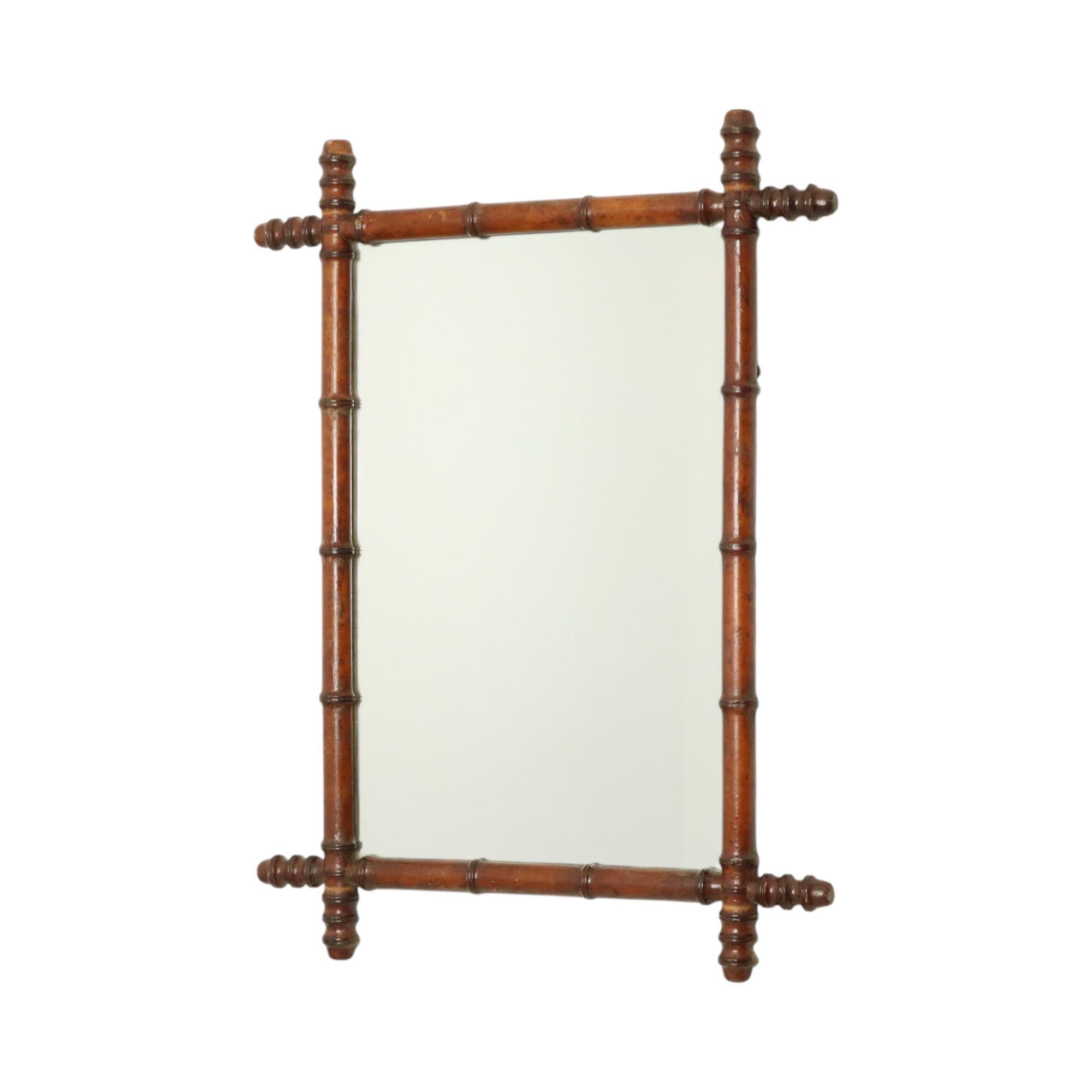 Antique faux bamboo mirror with original mirror plate and back, completely in Chinoiserie style, this style was very popular in the Art Nouveau period, originating from France, this copy dates from around 1900.

This beautiful wooden frame is cut