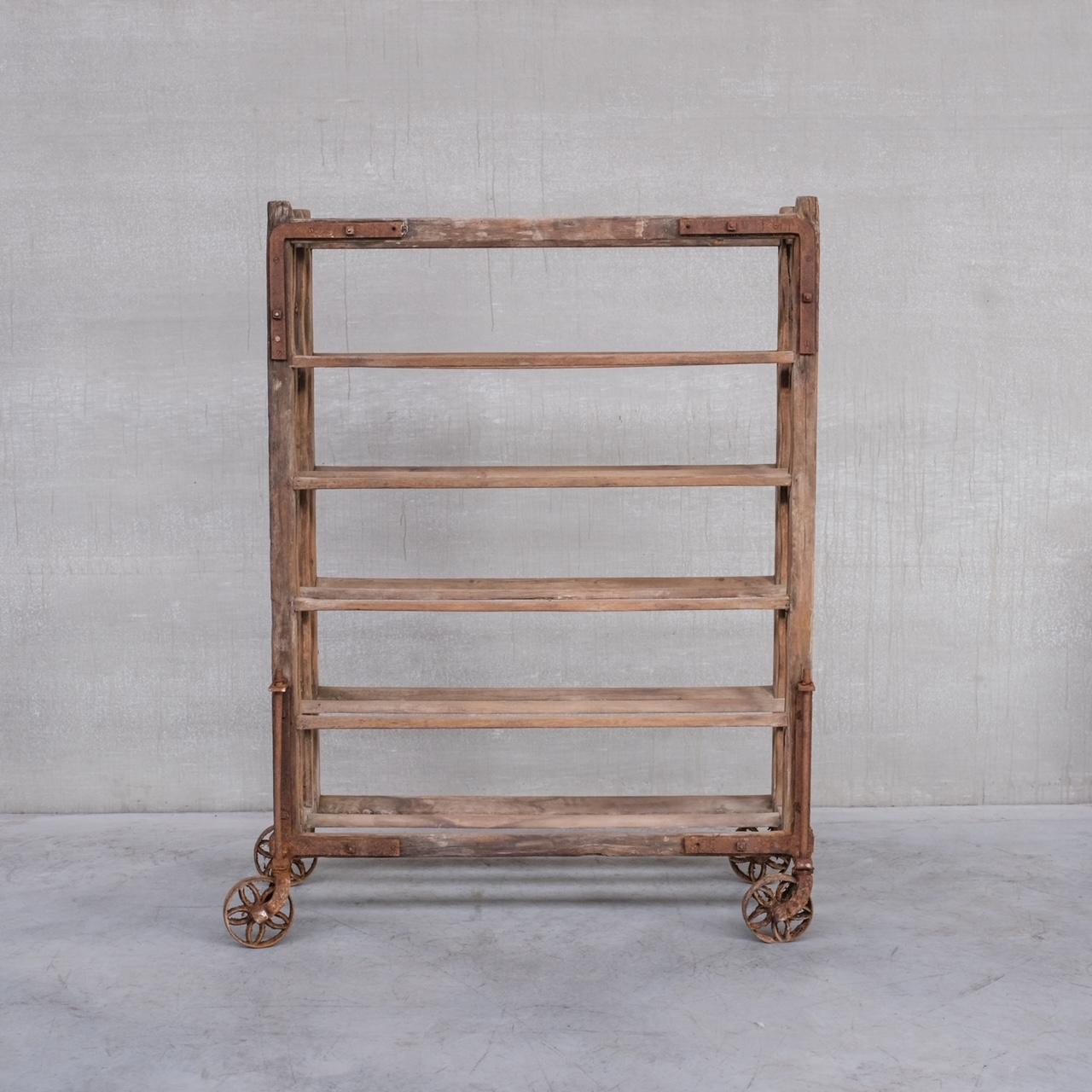 A increasingly rare totally authentic bakers shelving trolley of large size. 

France, c1920s. 

Heaps of character with the worn iron wheels and the wood which has seen years of use. 

Structurally still very sound. Some scuffs and wear