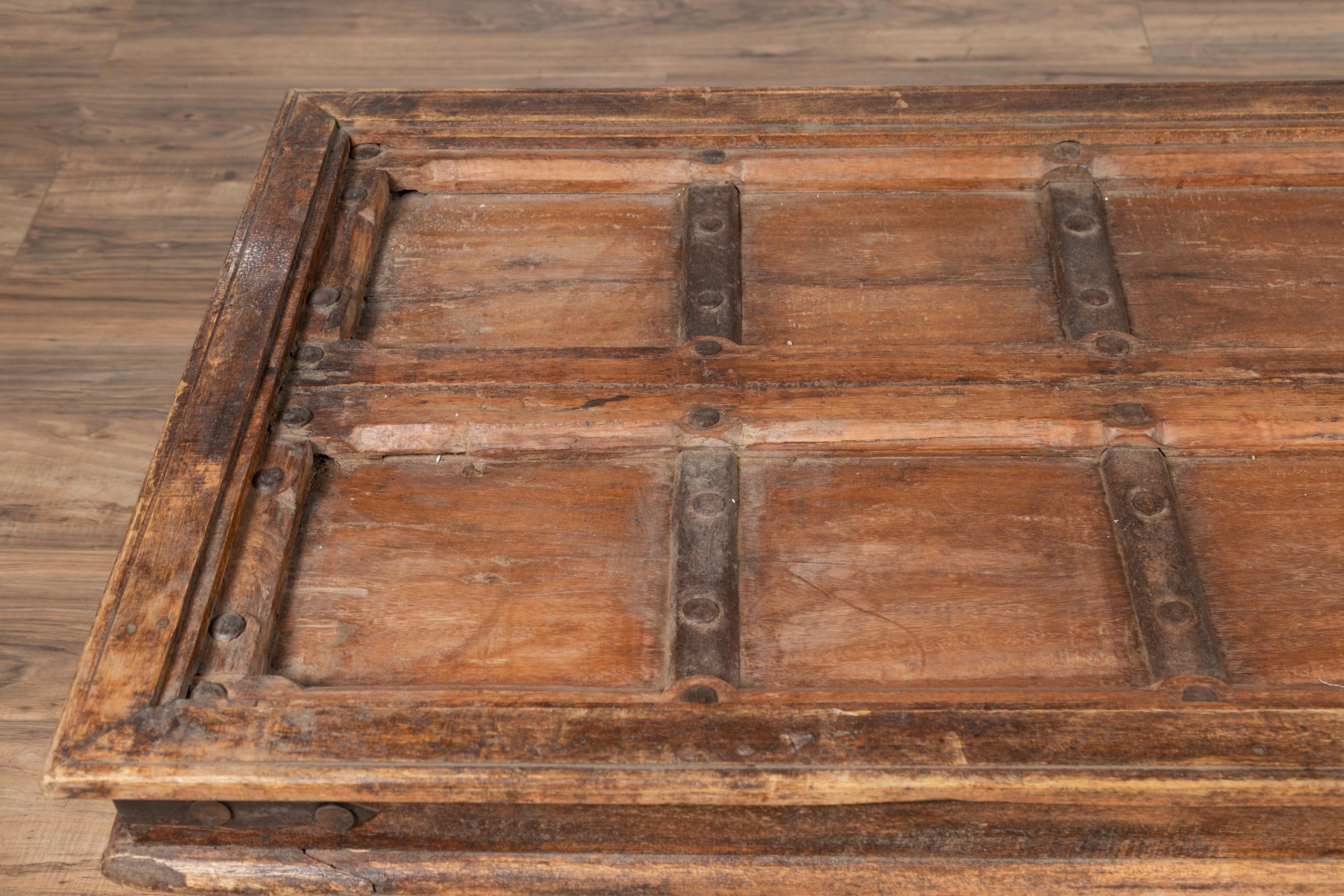 Antique Wooden Indian Palace Door Made into Coffee Table with Iron Braces In Good Condition In Yonkers, NY