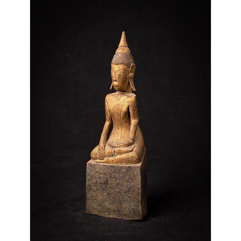 Material: wood
27,5 cm high 
9,2 cm wide and 7,5 cm deep
Weight: 0.447 kgs
Gilded with 24 krt. gold
Bhumisparsha mudra
Originating from Thailand
18th century

