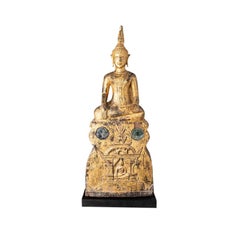 Antique wooden Laotian Buddha statue from Laos