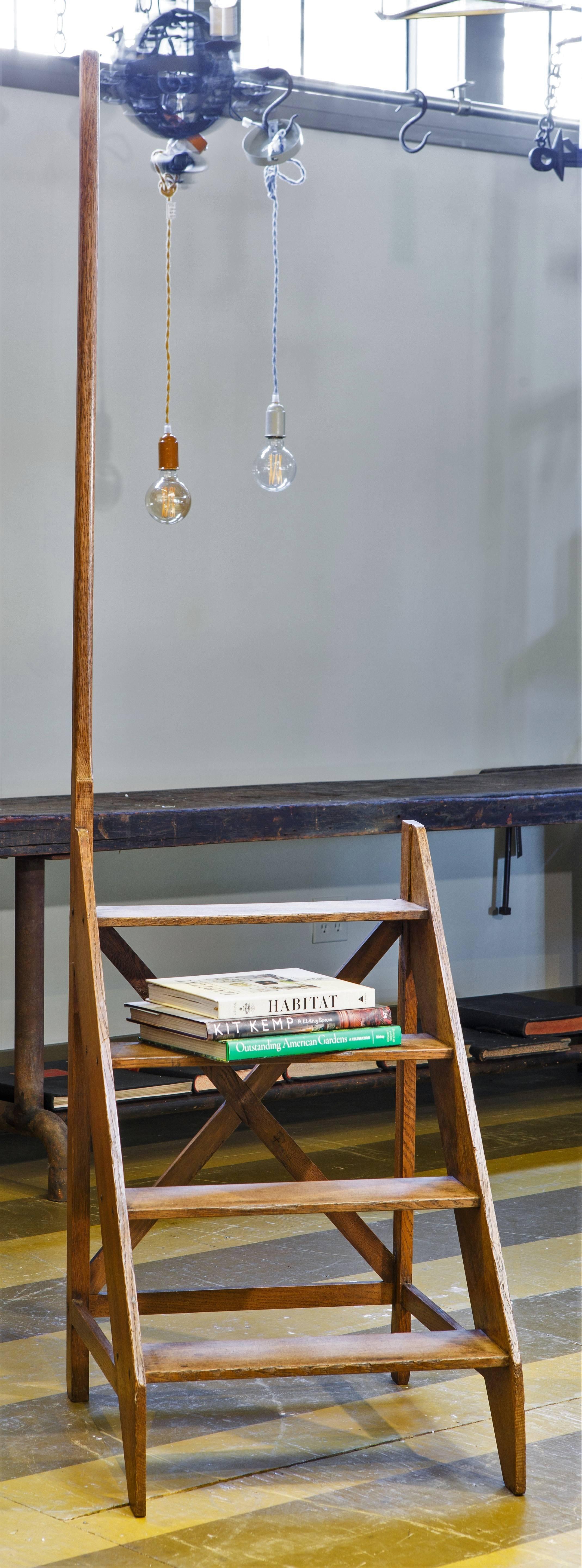 Handsome, sturdy antique library step ladder with handle.