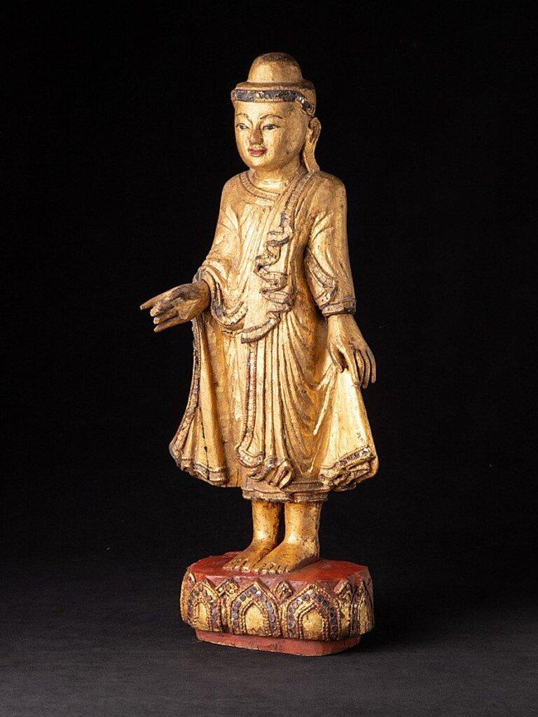 Material: wood
51,2 cm high 
20,8 cm wide and 14 cm deep
Weight: 1.6 kgs
Gilded with 24 krt. gold
Mandalay style
Originating from Burma
19th century.
 