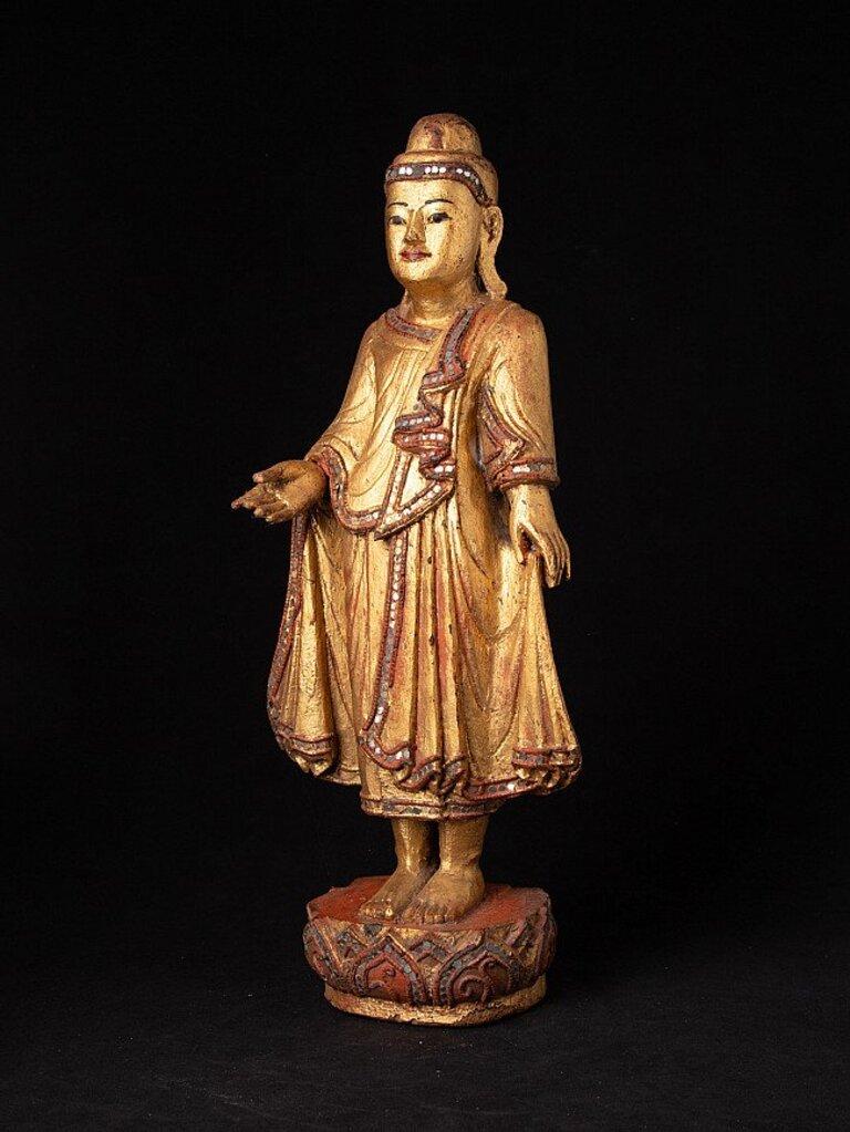 Material: wood
48,5 cm high 
19,4 cm wide and 12,5 cm deep
Weight: 1.651 kgs
Gilded with 24 krt. gold
Originating from Burma
19th century
