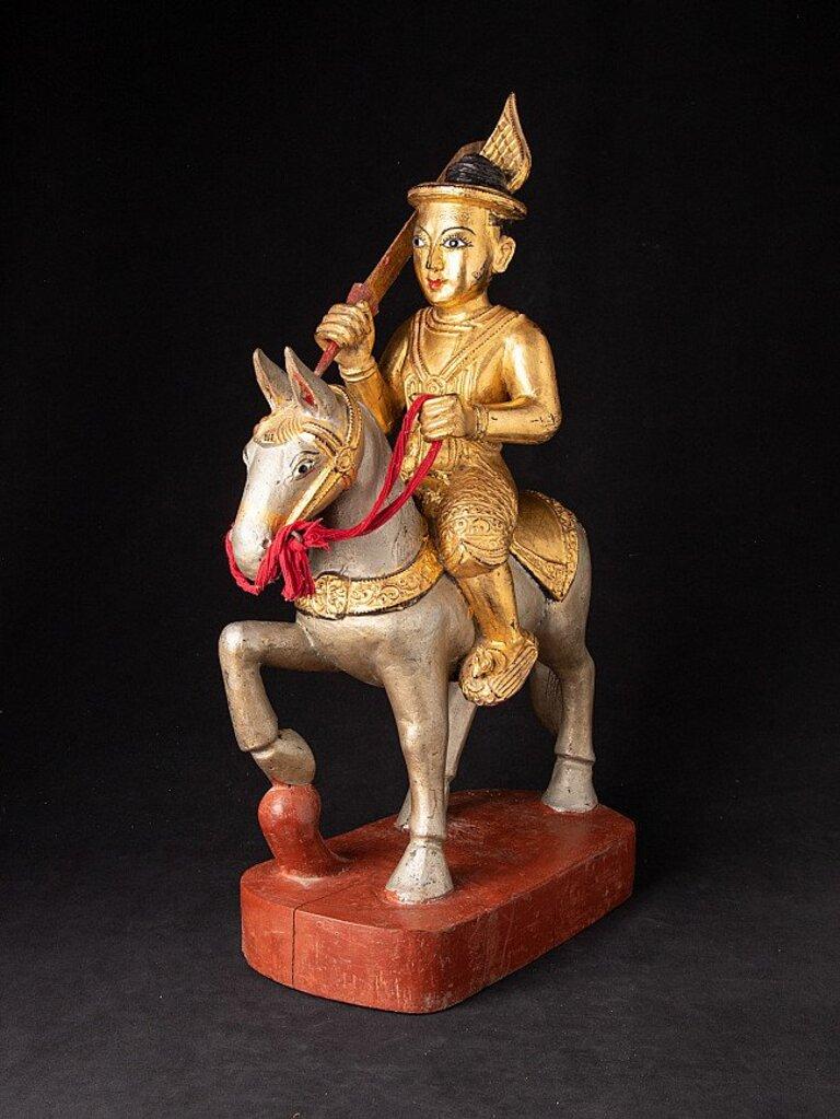 Material: wood
64 cm high 
18,3 cm wide and 40,2 cm deep
Weight: 7.3 kgs
Gilded with 24 krt. gold
Originating from Burma
Late 19th century
With inlayed eyes.
 